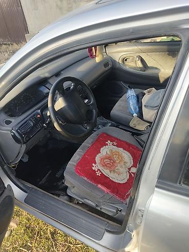 кронс: Mazda Cronos: 1994 г., 2 л, Механика, Бензин, Седан — 6