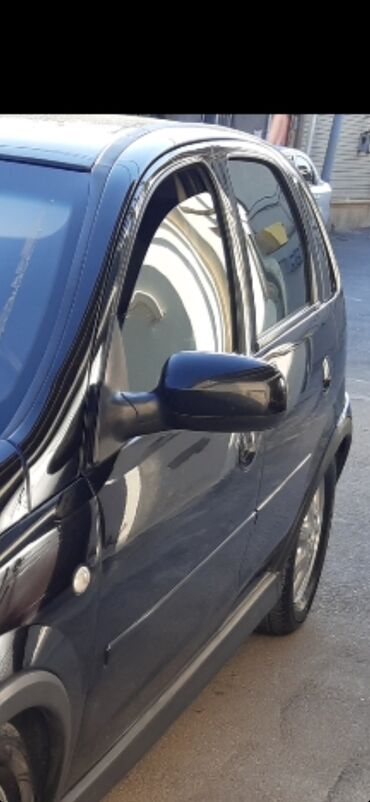 cone cors: Salam.opel corsa c.sol yan güzgü və korpusu satılır