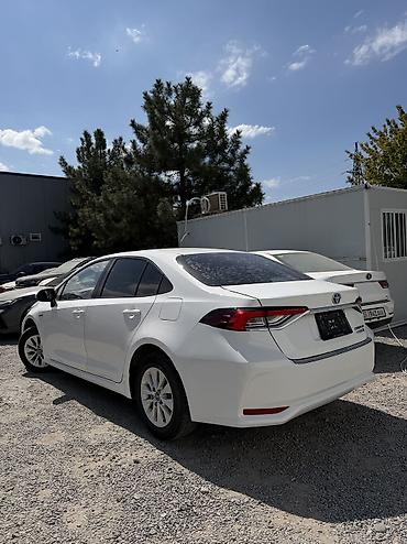 byd e6: Toyota Corolla: 2022 г., 1.8 л, Вариатор, Гибрид, Седан — 3