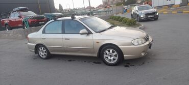 радиатор опель зафира а: Kia Spectra седан, золотистый цвет кузова. Ключевые особенности: -