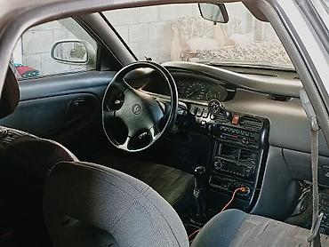 golf variant: Mazda 626: 1992 г., Механика, Бензин, Лифтбек — 4