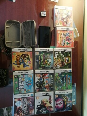 Ηλεκτρονικά: Nintendo ds, με θήκη και 12 παιχνίδια Η θήκη σε μέτρια κατάσταση