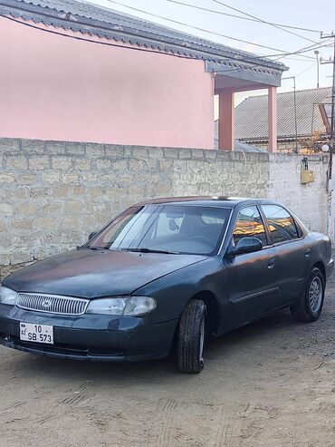 ilkin odenis 1000 manat masin: Kia Clarus: 2 l | 1997 il Sedan