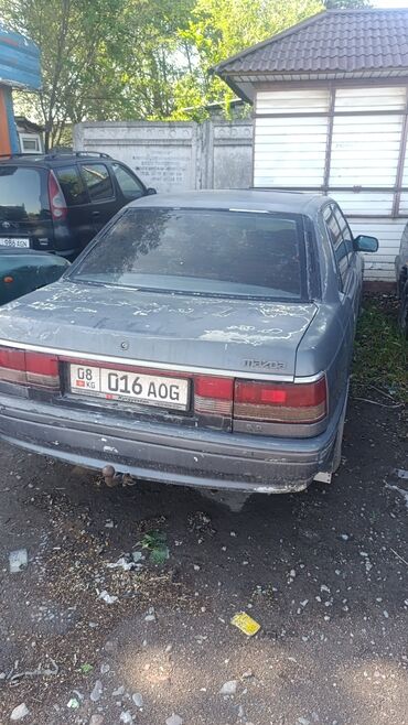 Mazda: Mazda 2: 1990 г., 2 л, Механика, Бензин, Седан