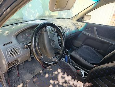 мазда 323 фк: Mazda 323: 1998 г., Хэтчбэк — 9