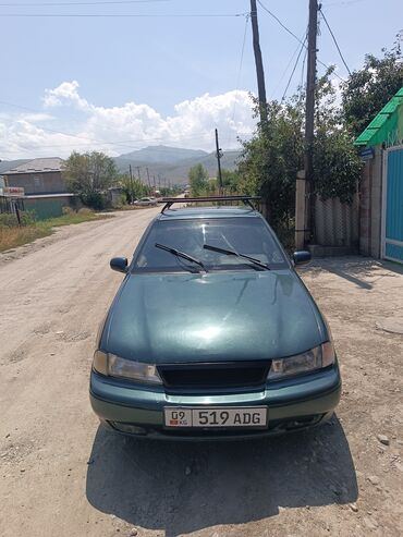 корейские автомашины: Автомобиль Daewoo Nexia в цвете "темно-зеленый металлик" с кузовом