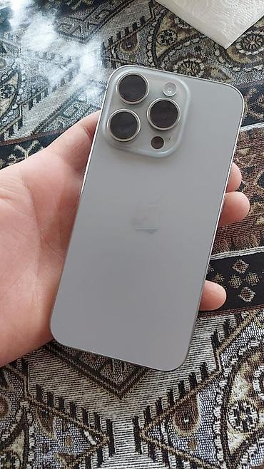 islenmis soyuducu: IPhone 15 Pro, 256 GB, Natural Titanium, Face ID — 2