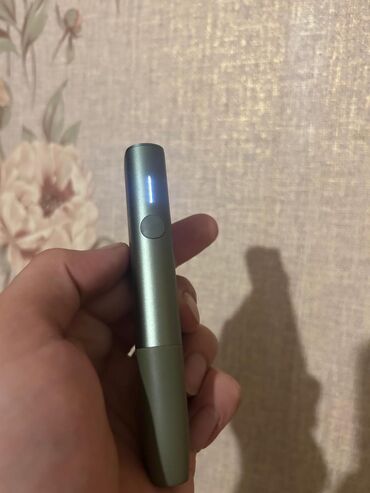 tek pencek: Məhsul: IQOS lil SOLID (yaşıl rəng) Təsvir: - Kompakt, birparça