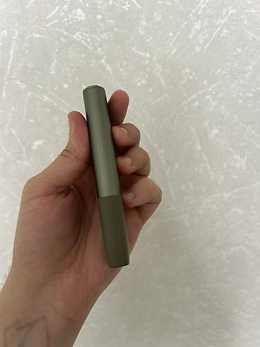 iqos stick: Məhsul: IQOS Iluma One (yaşıl rəng) Xüsusiyyətlər: - Tütün çubuqları — 8