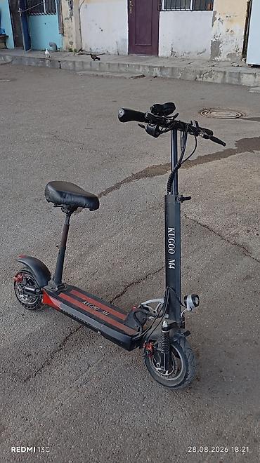 elektirikli samakat: KUGOO M4 elektrik skuter - Güclü ön işıq və siqnal/zəng düyməsi olan — 2