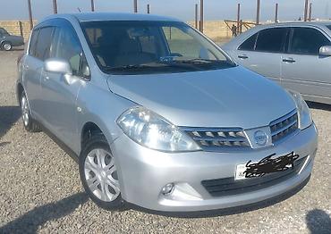 Nissan: Nissan Tiida hatchback - Kuzov: 5 qapılı hatchback, gümüşü rəng - — 7