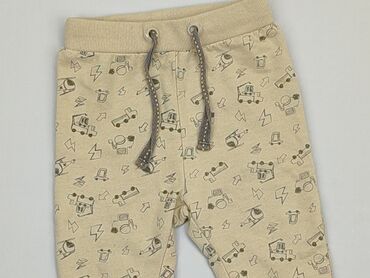 beżowe skórzane spodnie: Spodnie dresowe, 6-9 m, stan - Dobry