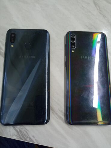 самсунг s 11: Samsung Galaxy A50, Колдонулган, 4 ГБ, түсү - Кара, 2 SIM