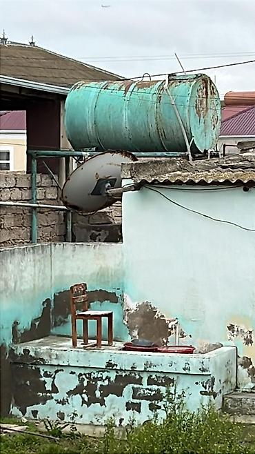 su radiator: 1000 litrlik dəmir su çəni satılır. Möhkəm maldır, sadəcə kosmetik — 1