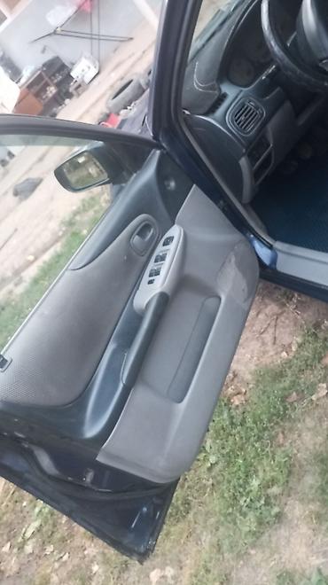 subaru legaci: Mazda 323: 2002 г., Универсал — 5