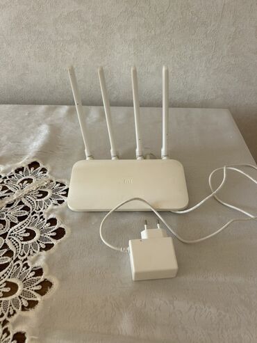 modem router tp link: Xiaomi WiFi modem 3C . islek vəziyyətdədir problemi yoxdur. məhsul