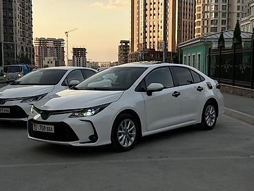 byd e2: Toyota Corolla: 2021 г., 1.8 л, Вариатор, Гибрид, Седан — 7