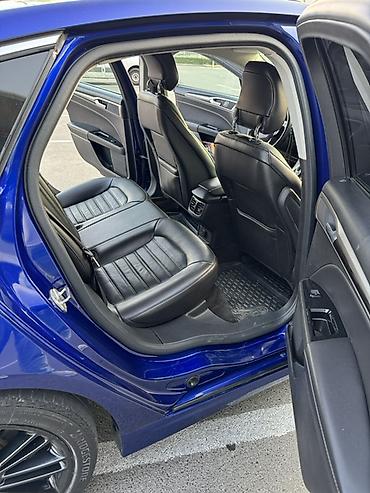 Транспорт: Ford Fusion sedan – mavi rəng, 4 qapı, ön və arxa park yerlərində — 8