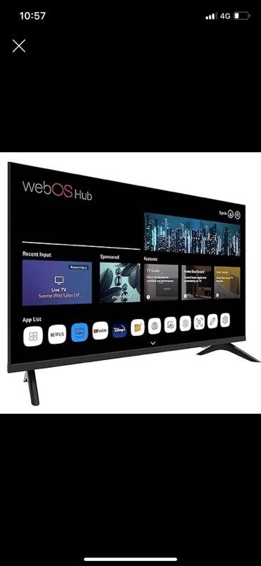 тв стик: Современный Smart TV черного цвета, оснащенный операционной системой