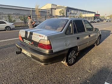 bmw 5 e39: Daewoo Nexia: 2001 г., 1.5 л — 4