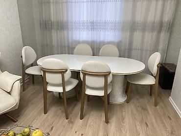 masa satilir: Ağ rəngli oval yemək masası və 6 ədəd stul dəsti dəyərindən çox aşağı — 1
