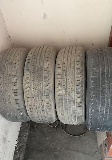 балон для плавания: Комплект из 4 автомобильных шин, летний дорожный рисунок протектора — 1