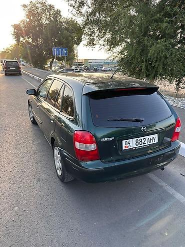 daf 95 480: Mazda 323: 2000 г., 1.6 л, Механика — 3