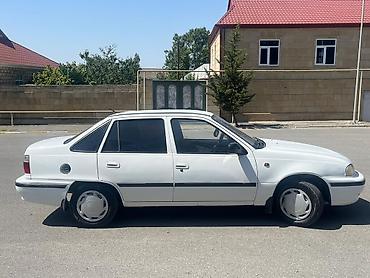 opel astra g opc: Ağ rəngli sedan, 4 qapılı, ön ötürücülü. Klassik, sadə dizaynlı kuzov — 8