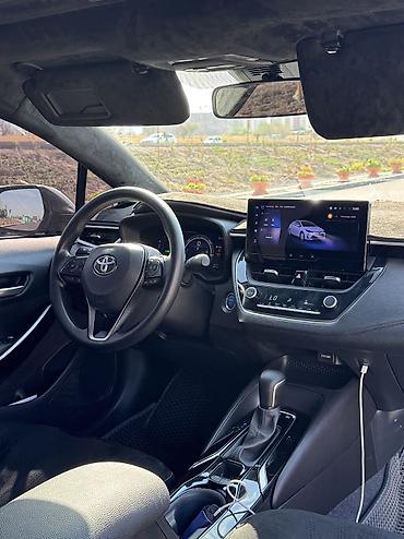 byd e1: Toyota Corolla: 2023 г., 1.8 л, Автомат, Гибрид, Седан — 6