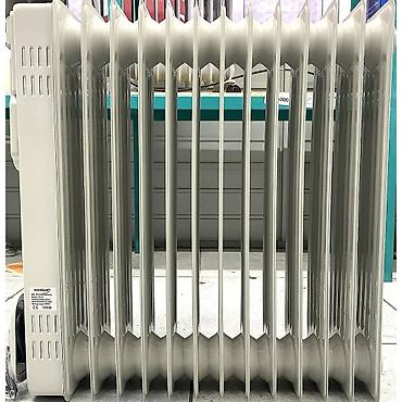 Масляные обогреватели: Масляный обогреватель Кол-во секций: 9 — 9