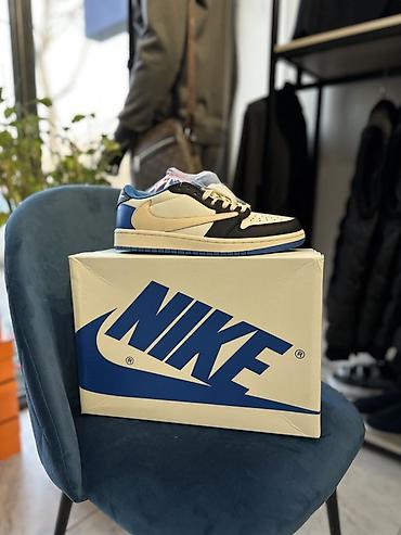 Жеке буюмдар: Кроссовки Nike Air Jordan 1 Low (цветовая схема с бежевыми, черными и — 1