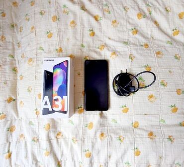 samsung a40 satilir: Samsung Galaxy A31, 64 GB, rəng - Qara