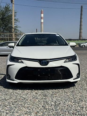 spark 2018: Toyota Corolla: 2019 г., 1.8 л, Вариатор, Гибрид, Седан — 1