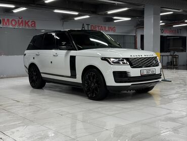 кофр на крышу автомобиля: Элегантный внедорожник Land Rover Range Rover белого цвета с