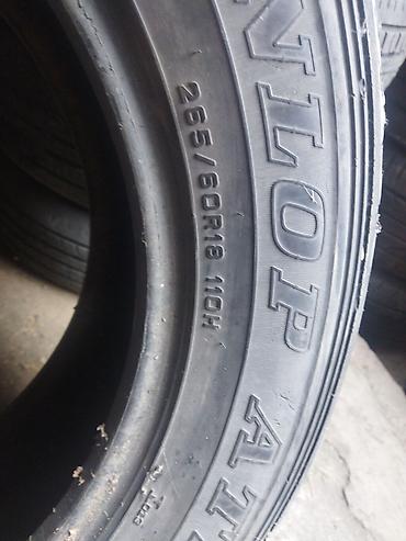 d 110: Шины 265 / 60 / R 18, Всесезонная, Б/у, Комплект, Внедорожные (АТ/МТ), Япония, Dunlop — 1
