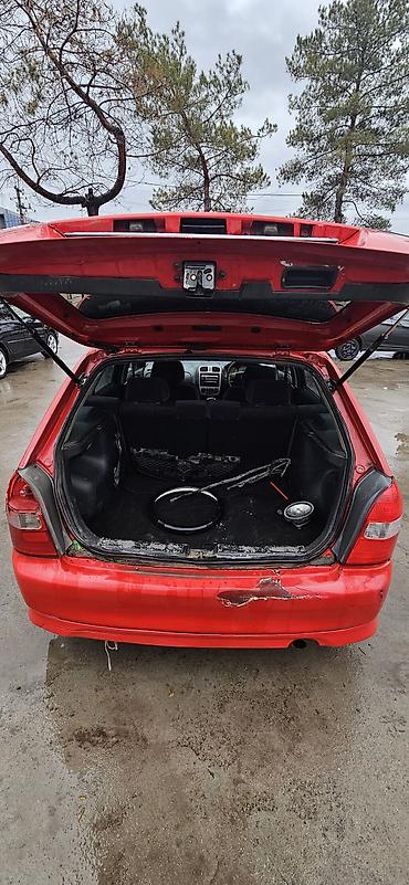 Mazda: Mazda Familia: 2001 г., 2 л, Автомат, Бензин, Универсал — 11