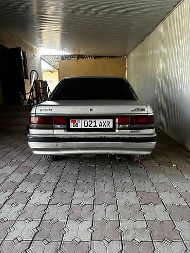трос багажника камри 30: Mazda 626: 1991 г., 2 л, Механика, Бензин, Седан — 3