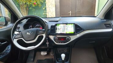 Kia: Kia Picanto, qəhvəyi/bronza rəng, 5 qapılı hetçbek. Xüsusiyyətlər: - — 9