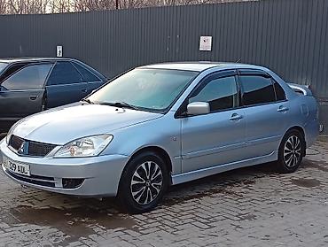 e34 4 4: Mitsubishi Lancer: 2006 г., 1.6 л, Автомат, Газ, Седан — 2