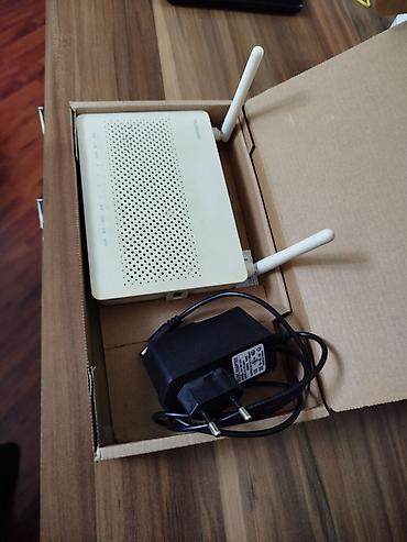 wifi modem satilir: Modem ruter satilir. lan ve optik kabelle isleyir — 2