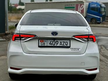 bmw ix3: Toyota Corolla: 2022 г., 1.8 л, Автомат, Гибрид, Седан — 4