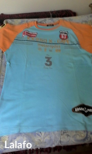 Majice: Interesantna sportska plava majca sa narandžastim rukavima, kvalitetan na lalafo.rs — 3 Majice: Interesantna sportska plava majca sa narandžastim rukavima, kvalitetan — 3