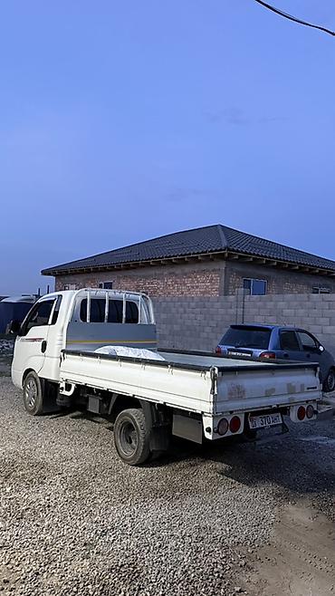 рамки номер: Kia Bongo III бортовой грузовик, белый цвет. Двухдверная кабина — 9