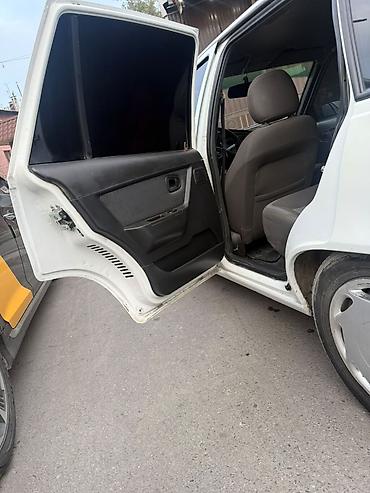 Daewoo: Daewoo Nexia: 2013 г., 1.6 л, Кол менен иштөөчү, Бензин, Седан — 10