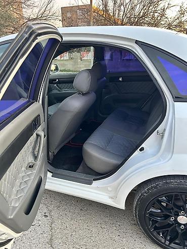 daewoo gentra oluxanasi: DAYVO GENTRA Xüsusiyyətlər: - Kuzov: ağ rəngli sedan, tünd bənövşəyi — 4