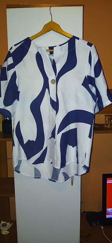 Donji deo: Ženske trenerke i haljina – set različitih komada 1) Crne sportske — 11