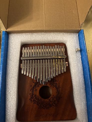elektro gitara satisi: Kalimba (barmaq pianinosu) – taxta korpuslu, metal dillərlə — 1