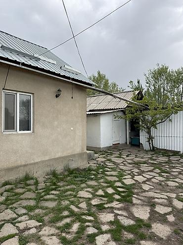 орошаемое земля: Продаётся участок с хоз двором в городе Каракол, улица Масанчы, свет — 6