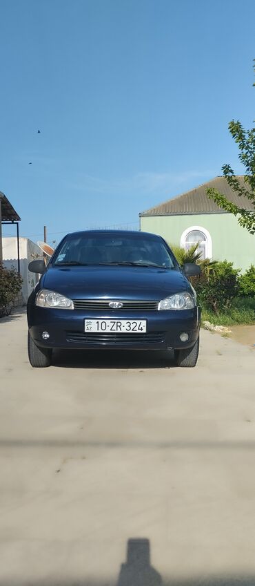 диски на авто ваз 2109: Mavi rəngdə Lada Kalina avtomobili. Bu, etibarlı və praktik avtomobil