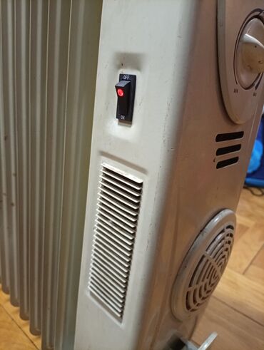 Uljani radijatori: Ulje­ni radijator Midea sa 12 rebara i ispravnim ventilatorom - Tip — 7